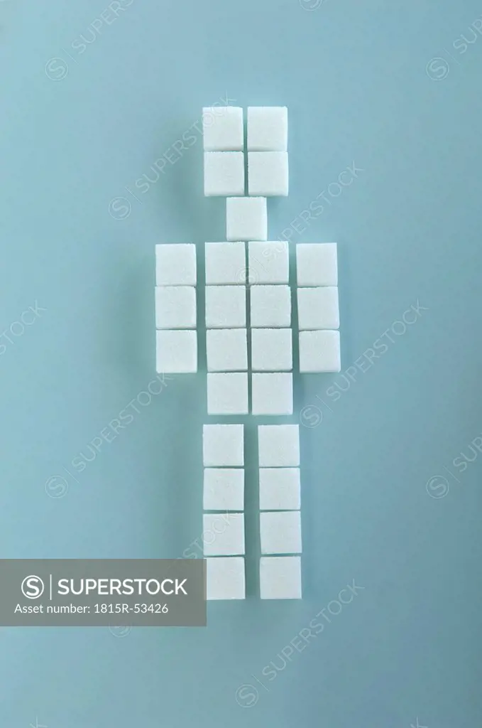 Sugar cubes arranged in shape of figurine, elevated view