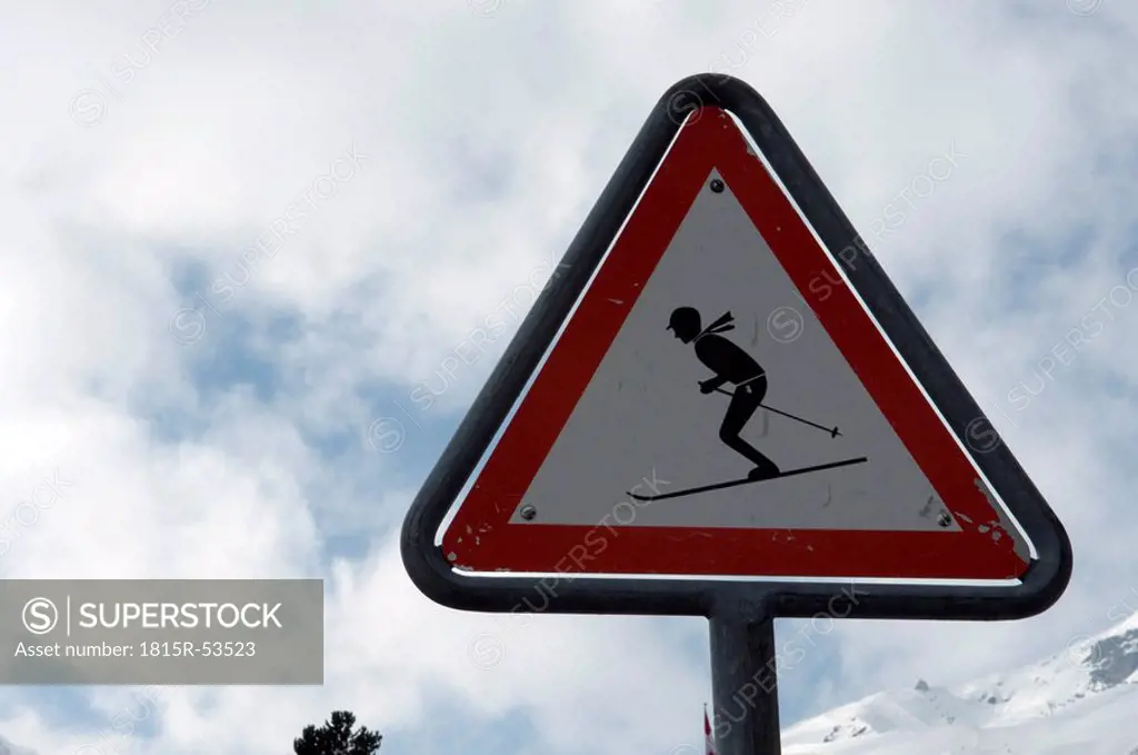 Switzerland, Graubünden, Arosa, Skier on Warning Sign, close_up