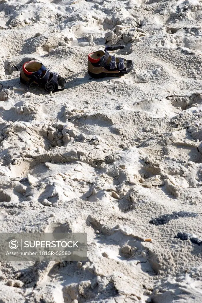 Germany, Amrum, Children´s shoes in the sand