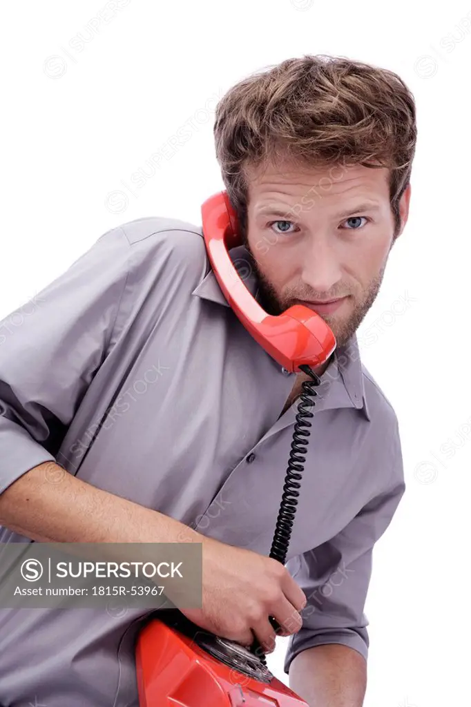 Businessman using phone, portrait