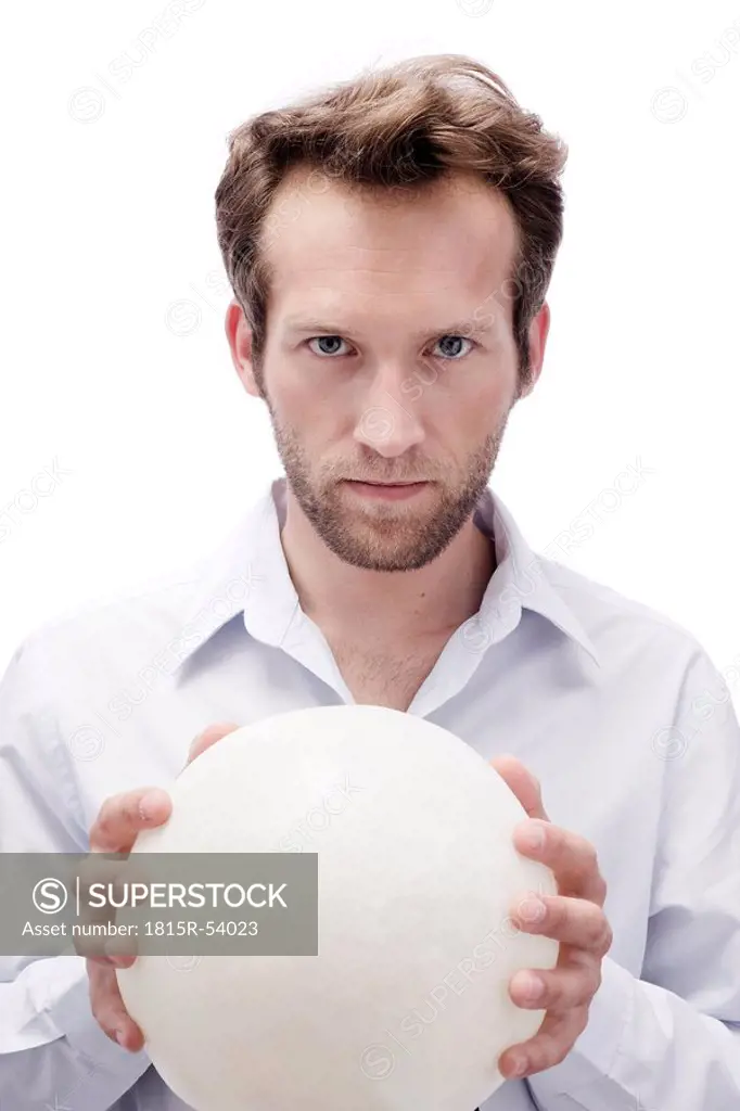 Young man with crystal ball, portrait