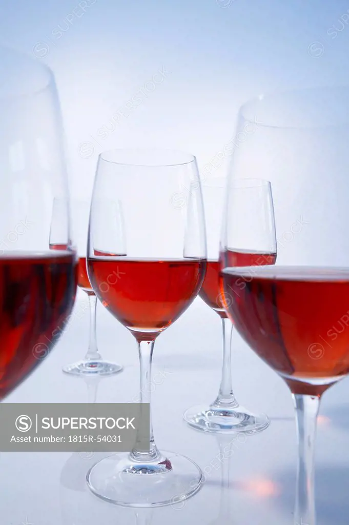 Rose wine glasses filled with rose wine
