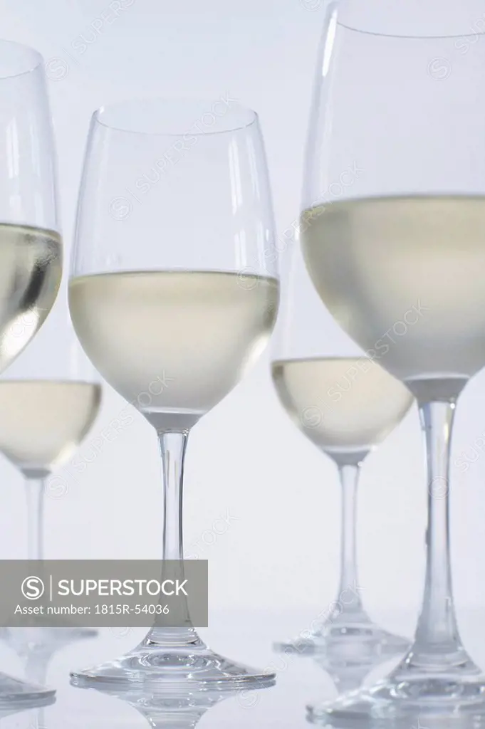 White wine glasses filled with white wine