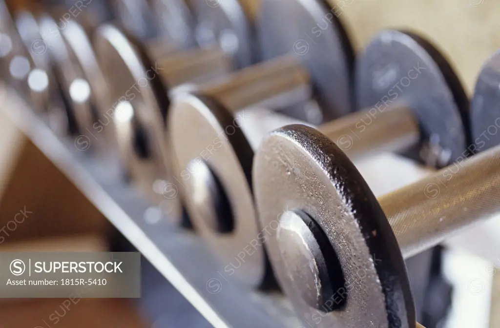 Dumbbells in a line, close up