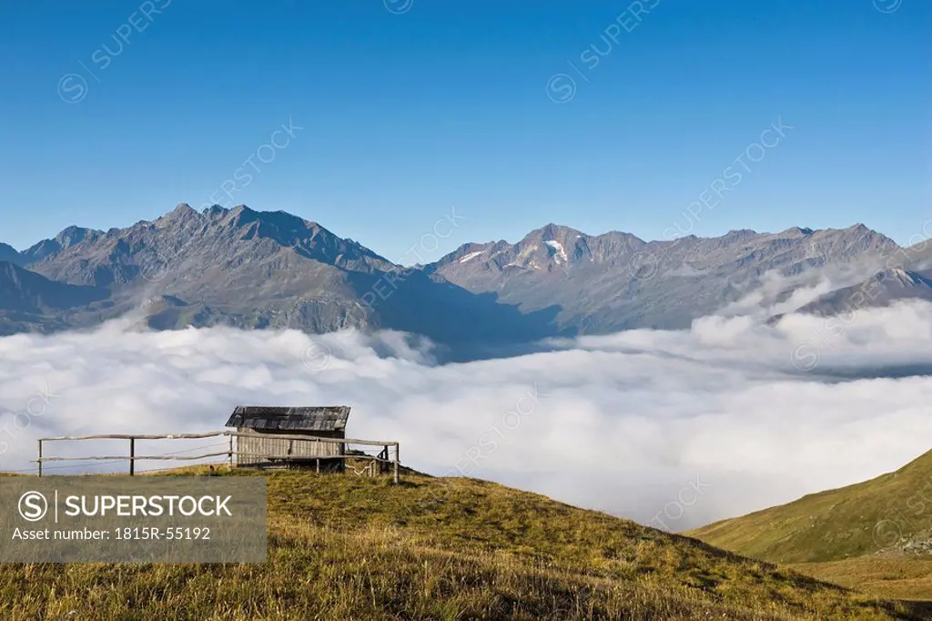 Austria, Großglockner, Mountain scenery, Cabin and clouds