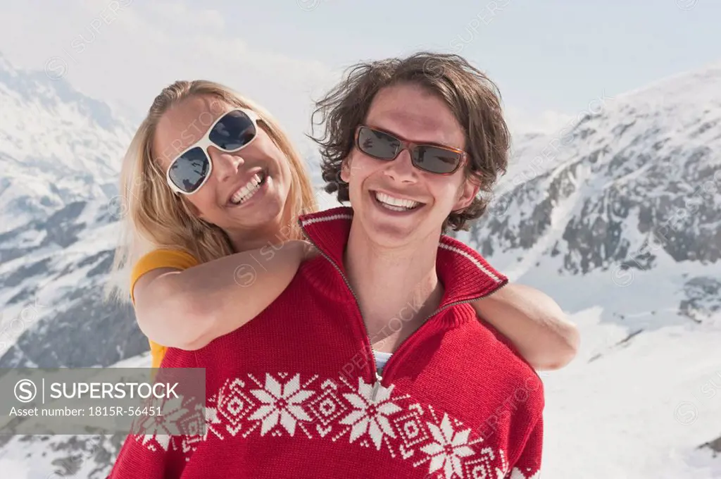 Austria, Salzburger Land, Young couple smiling, portrait, close_up