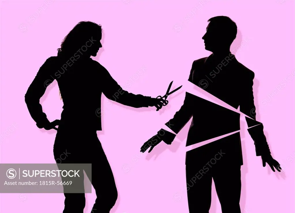 Silhouettes of couple, woman using pair of scissors