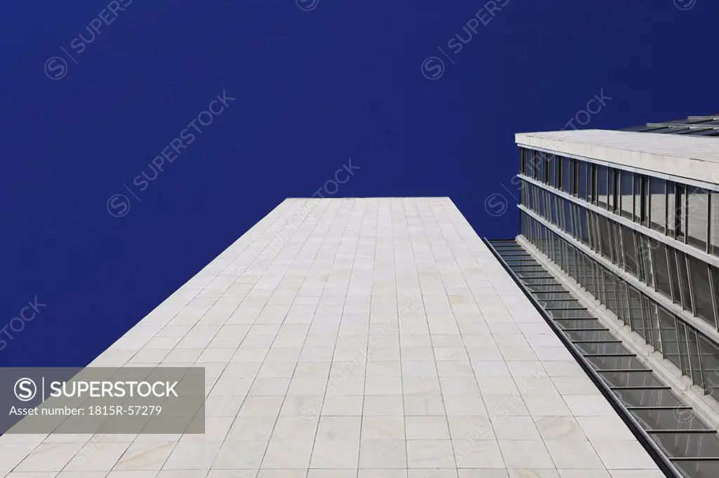 High rise building against blue sky, low angle view