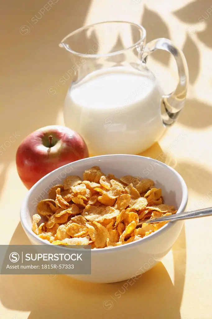 Cornflakes, apple and milk and, close_up