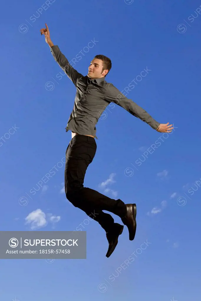 Man levitating, side view