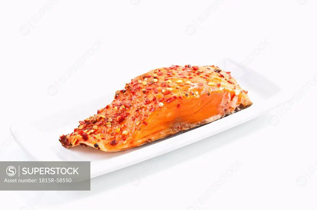 Salmon with herbs on platter