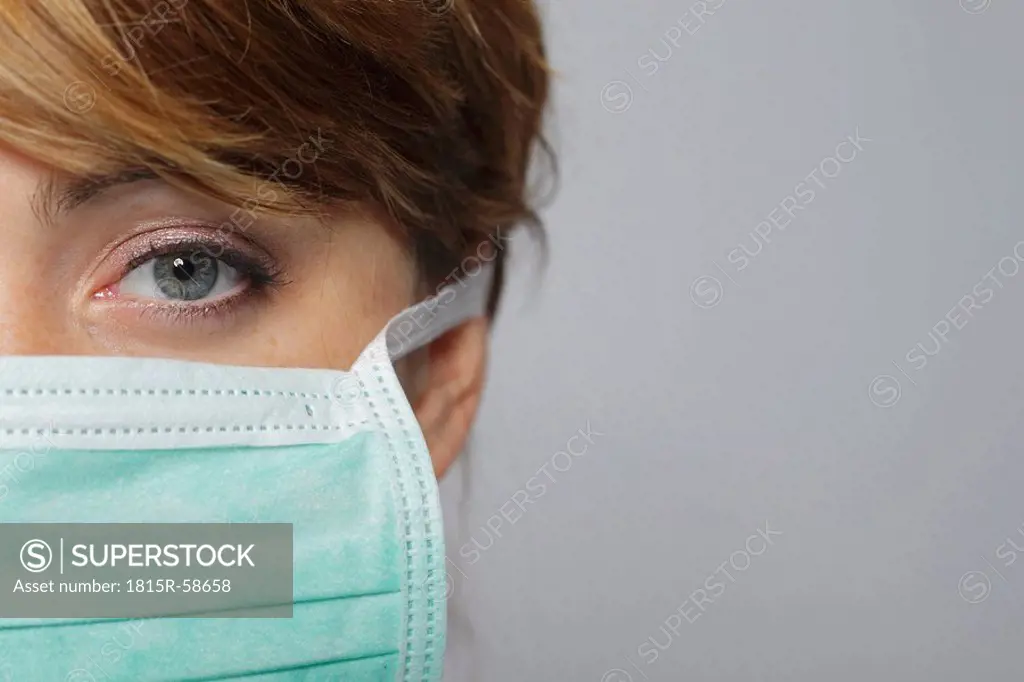 Female doctor wearing surgical mask, portrait, close_up