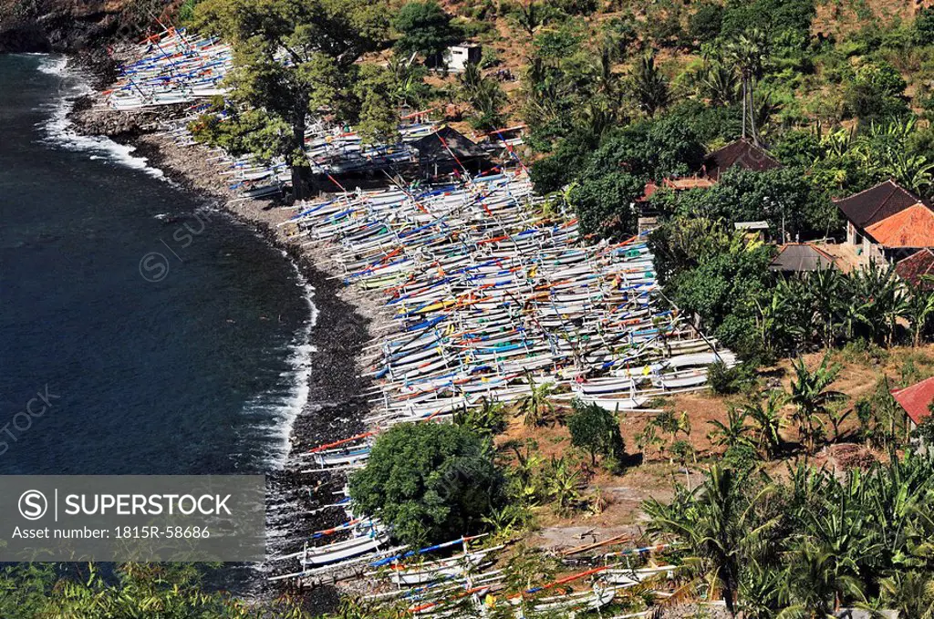 Asia, Indonesia, Bali, Outrigger canoes on beach, elevated view