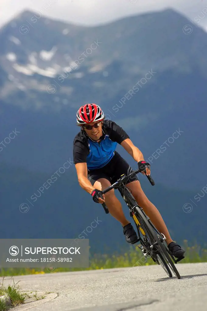 Germany, Bavaria, Mittenwald, Man mountain biking