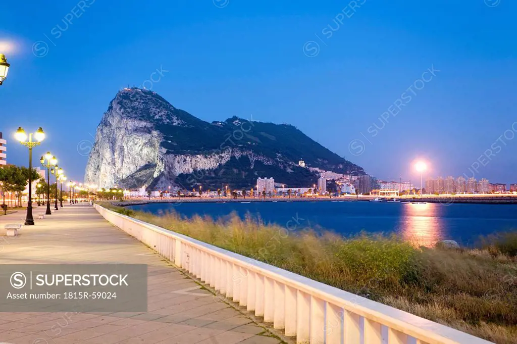 Spain, Andalusia, Rock of Gibraltar seen from La Linea at twilight
