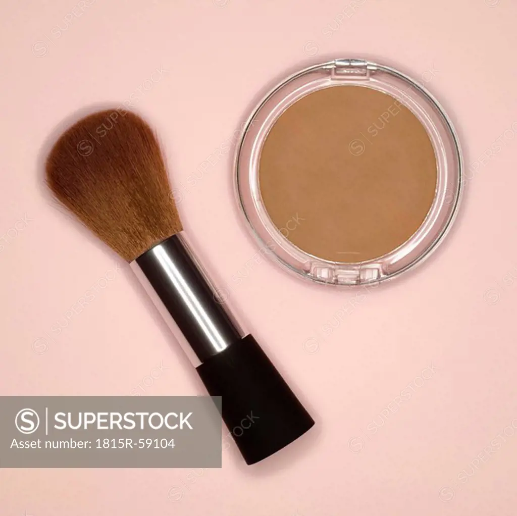 Brush and compact powder, elevated view