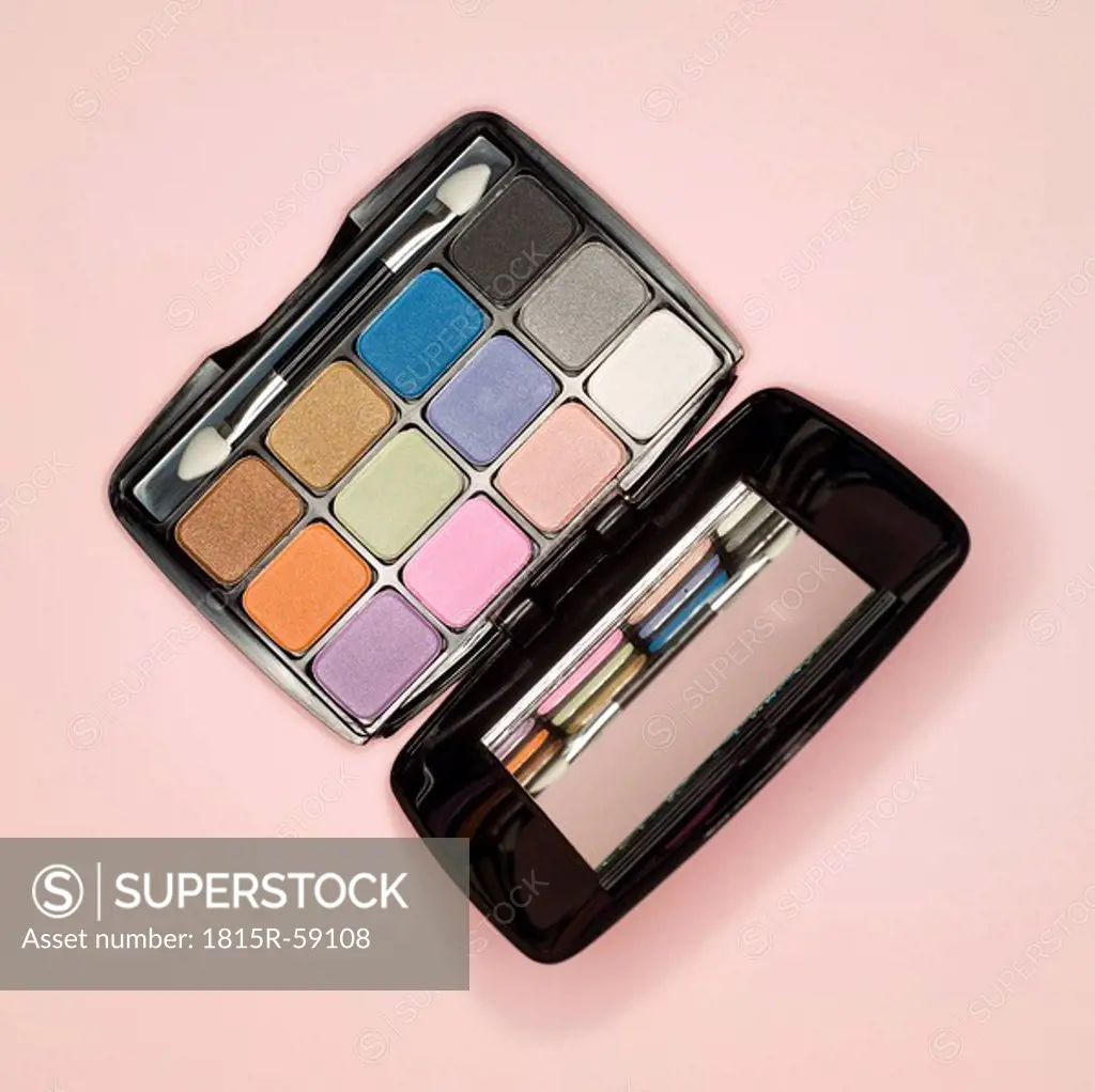 Eye shadow compact and applicator, elevated view
