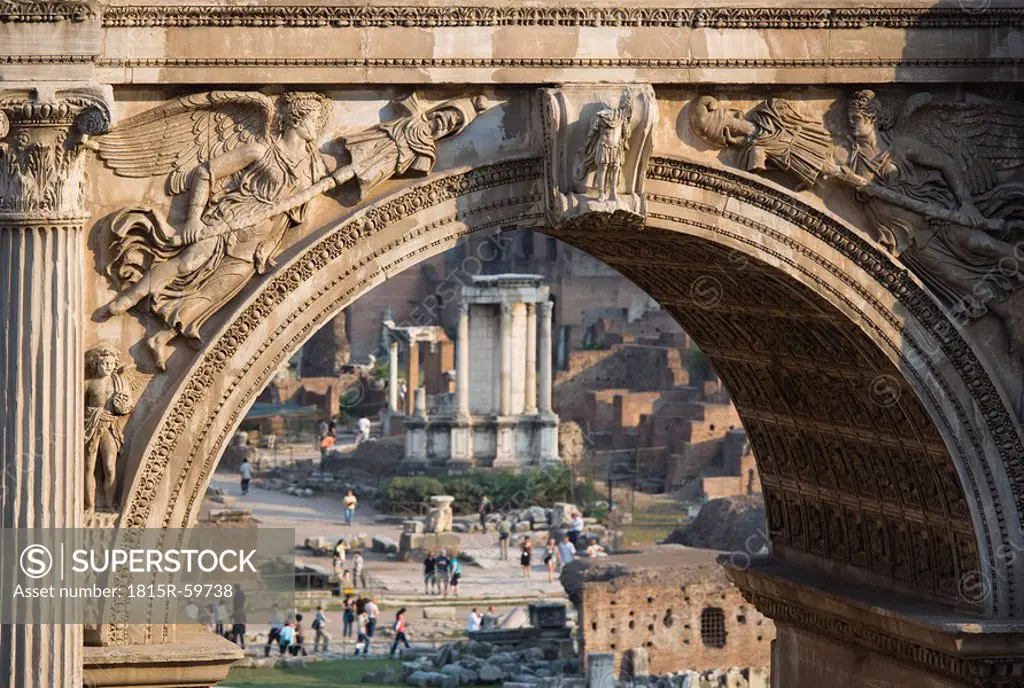 Italy, Rome, Arch of Septimius Severus, Temple of Vesta in background