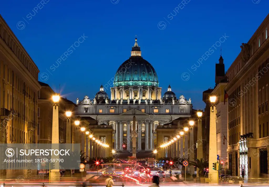 Italy, Rome, Vatican City, Traffic at night, Basilica of Saint Peter in background