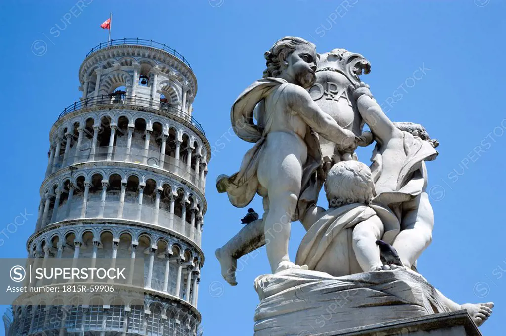 Italy, Tuscany, Pisa, Piazza dei Miracoli, Square of Miracles, Leaning tower and sculpture