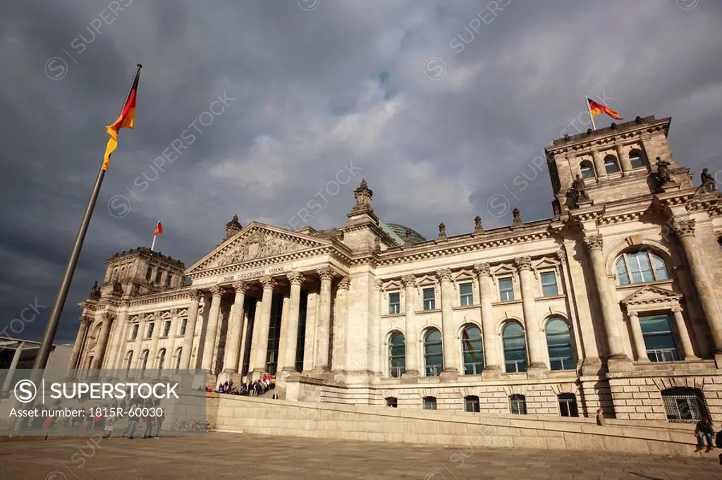 Germany, Berlin, Reichstag building with tourists in background