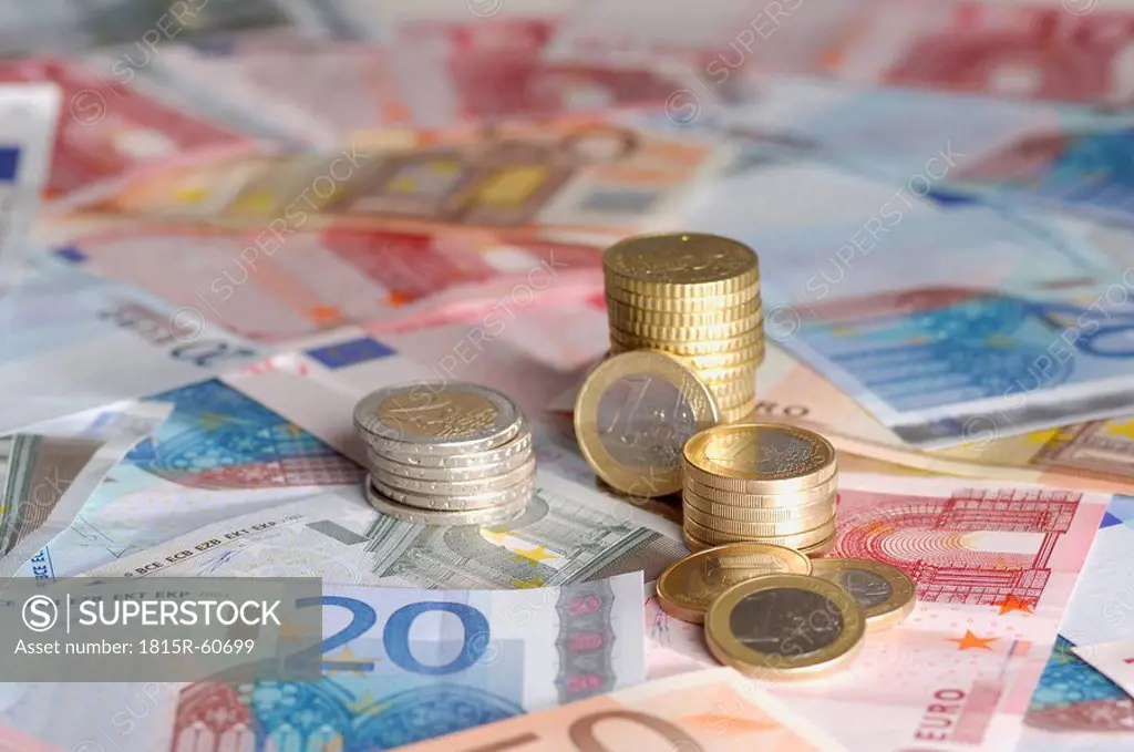 Euro notes and coins, close up