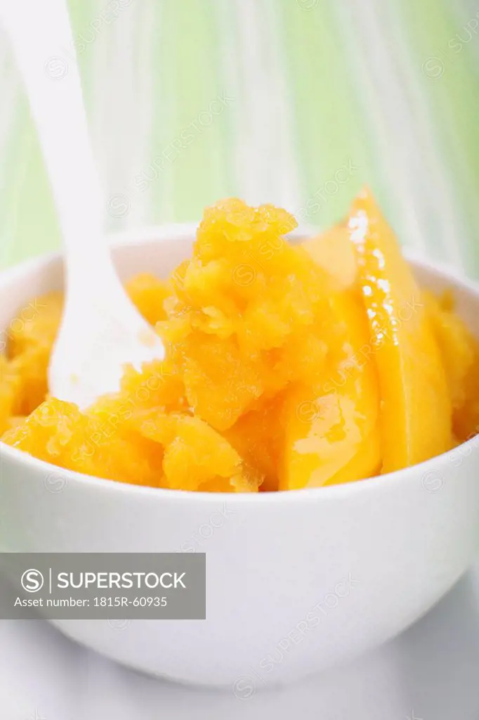 Mango dessert in bowl, close_up