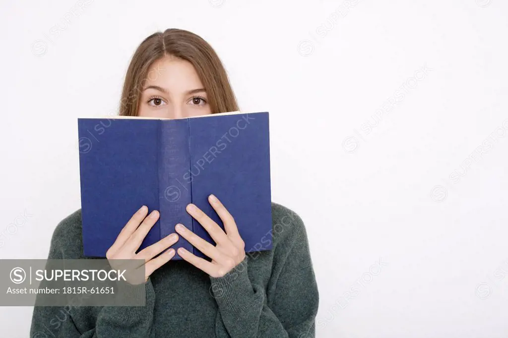 Young woman 16_17 reading book