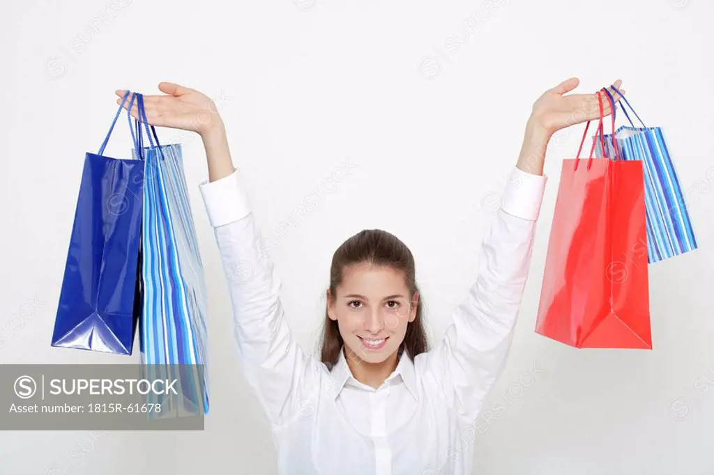 Young woman 16_17 with shopping bags