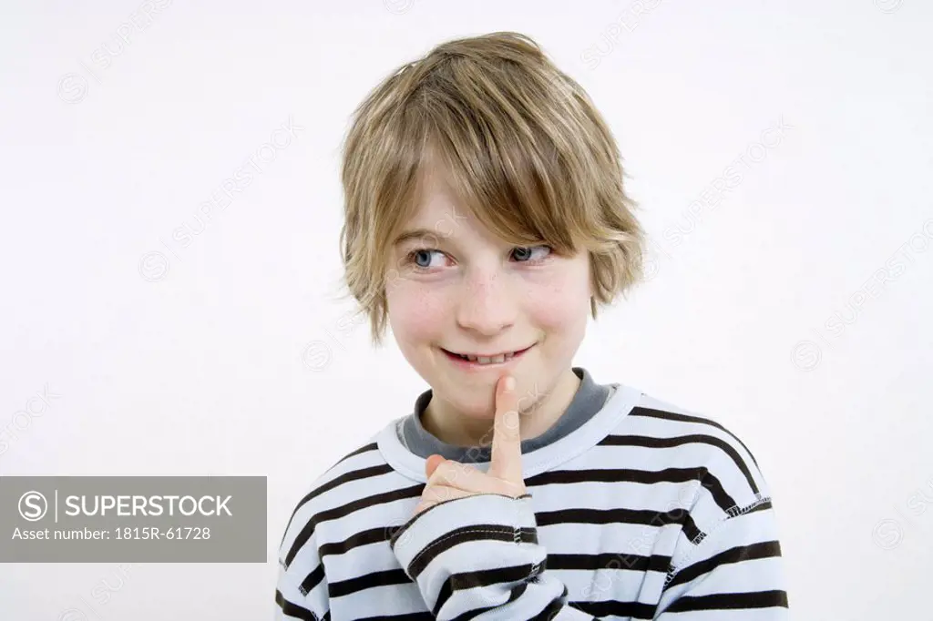 Boy 10_11, finger to chin, portrait
