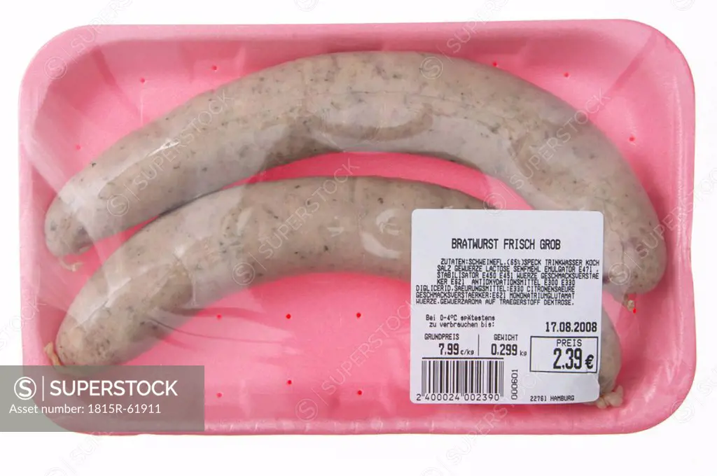 Fresh pork sausages in styrofoam plate, close_up