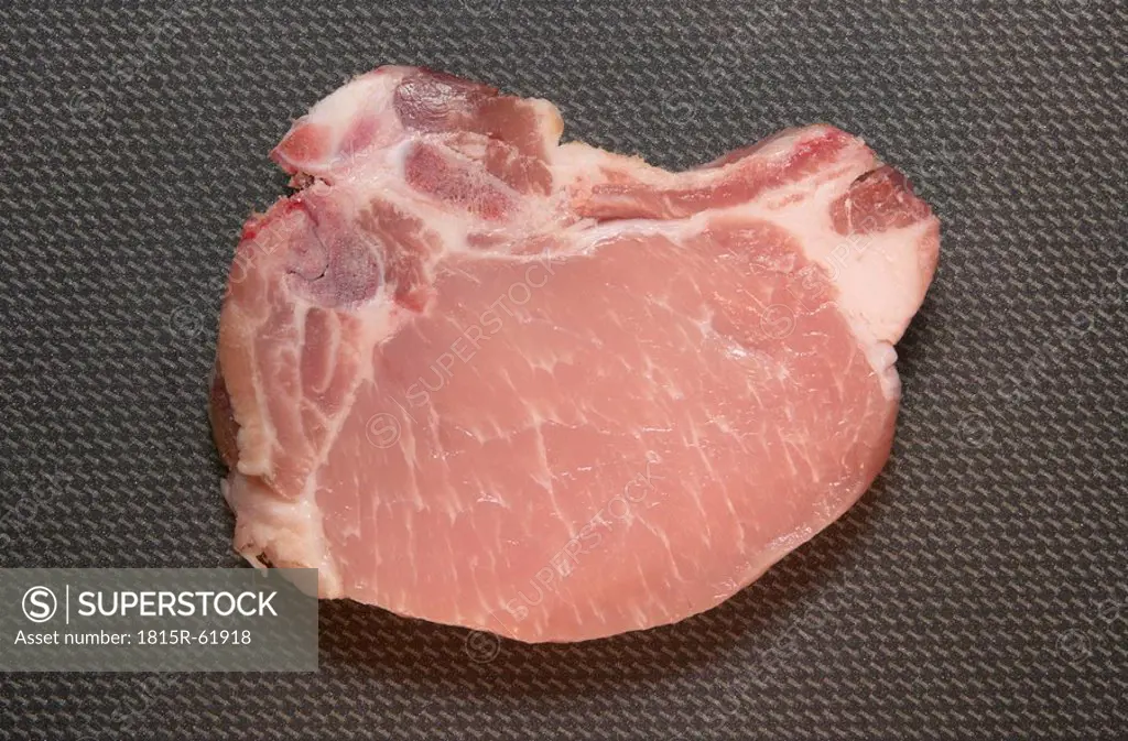 Raw pork chop, elevated view