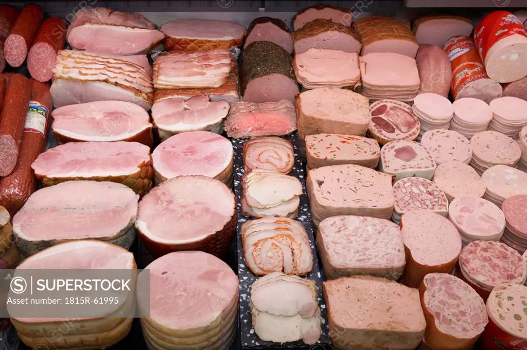 Various sausages display in supermarket, elevated view
