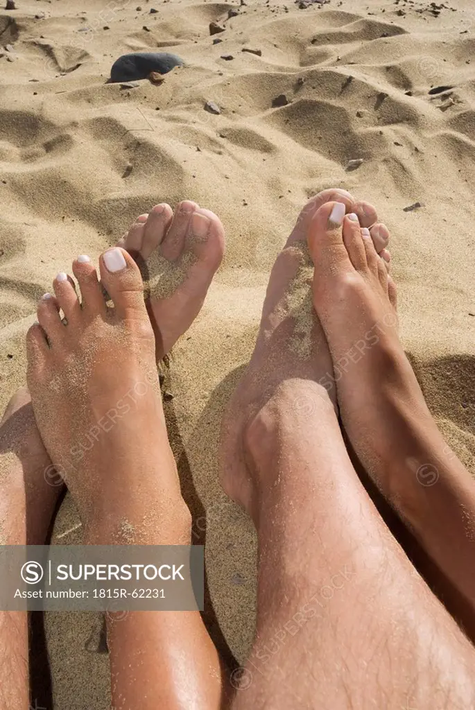 Spain, Lanzarote, Feet on sand, elevated view