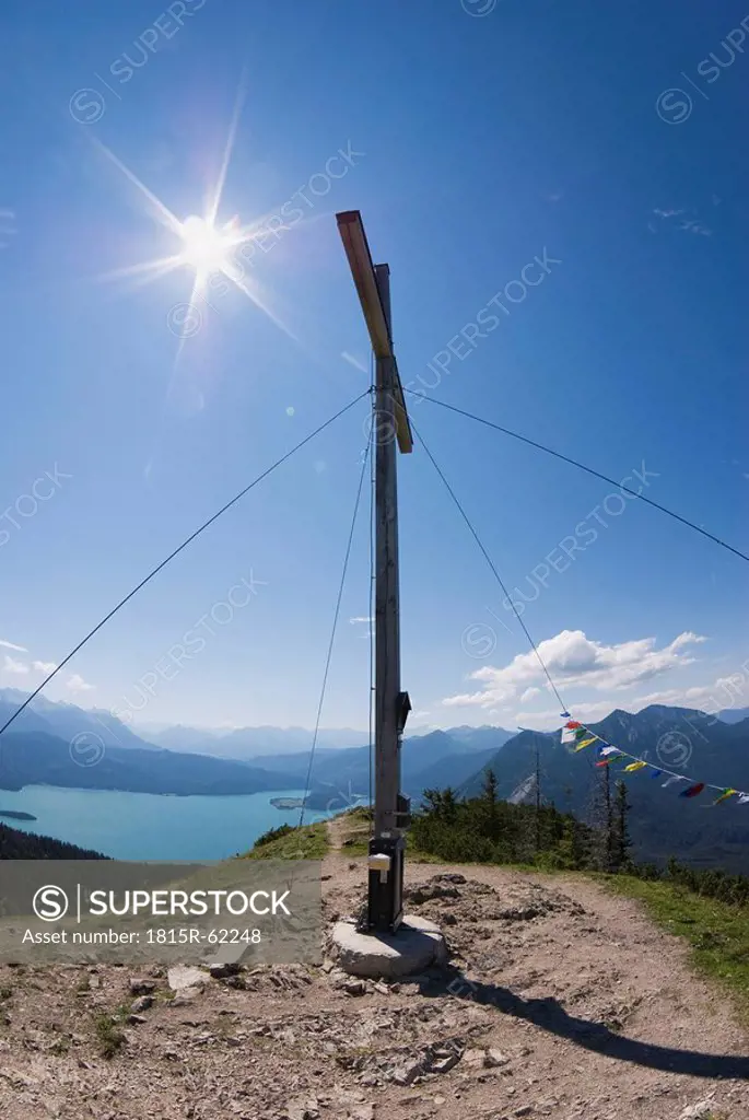 Germany, Bavaria, summit with cross, Lake Walchensee in background