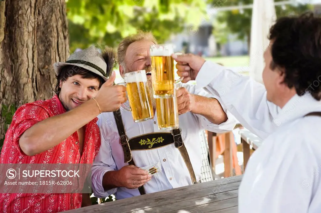 Germany, Bavaria, Upper Bavaria, Men in beer garden