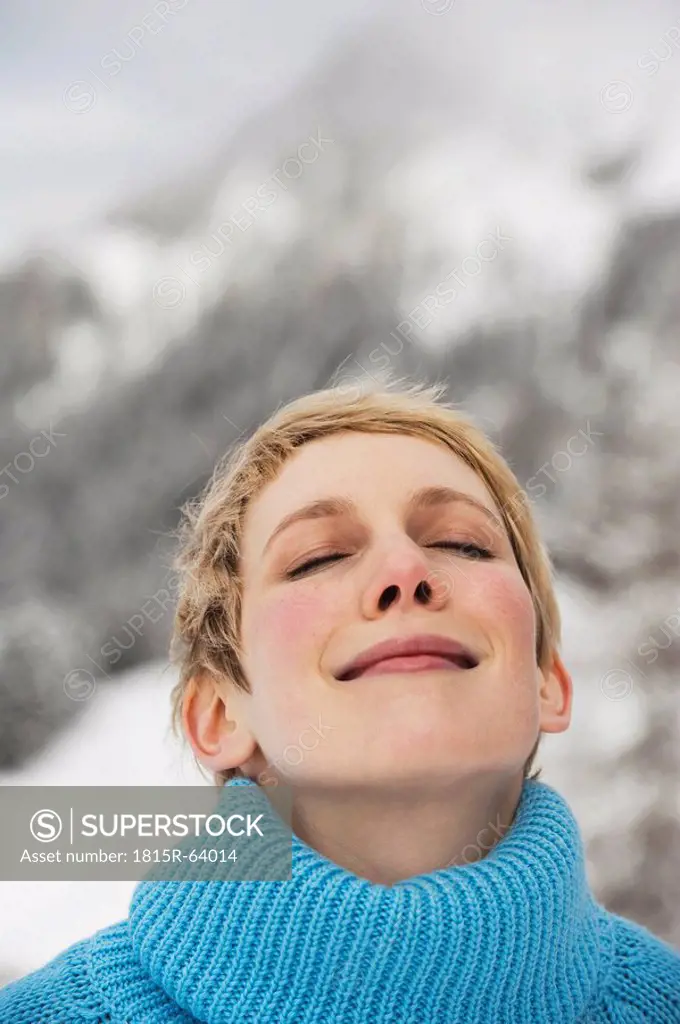 Italy, South Tyrol, Young woman, eyes closed, portrait