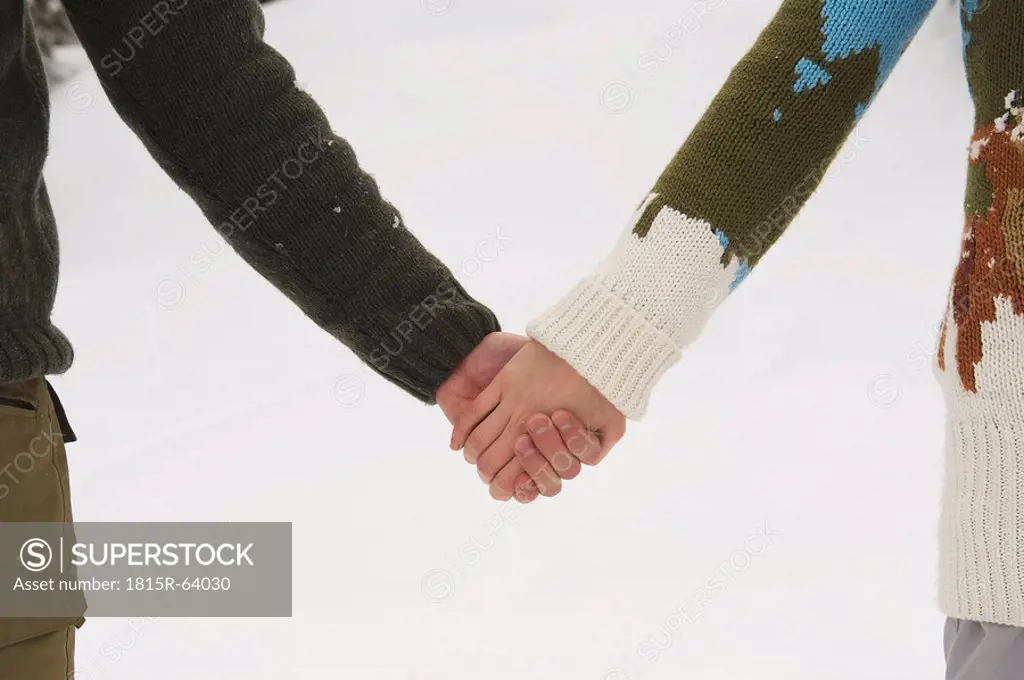 Italy, South Tyrol, Persons holding hands, close up