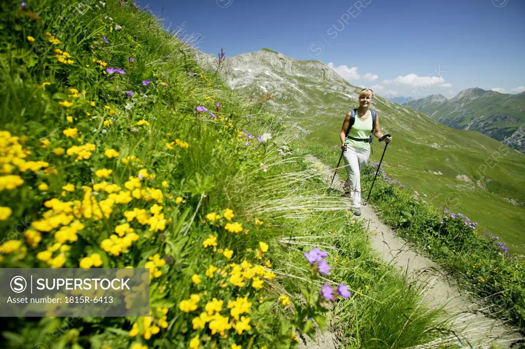 Woman hiking in austrian alps, elevated view