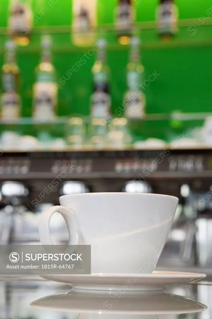 Germany, Cologne, Empty coffee cup on counter