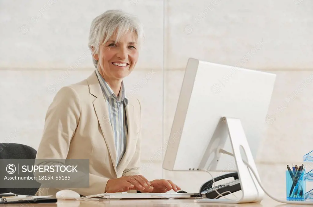 Senior Businesswoman using computer