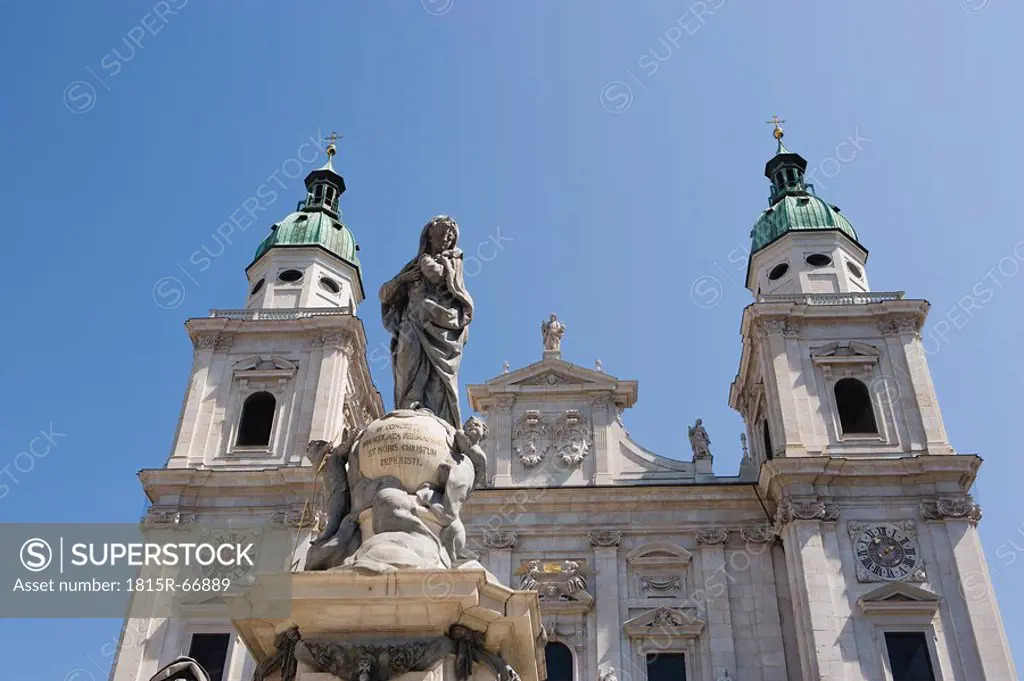 Austria, Salzburg Cathedral and statue of the Virgin Mary, low angle view