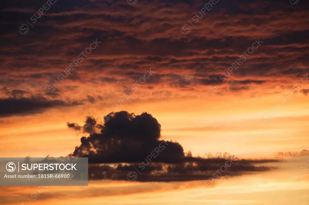 Austria, Cloudy sky with afterglow