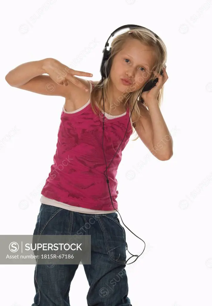 Girl 10_11 wearing headphones, portrait