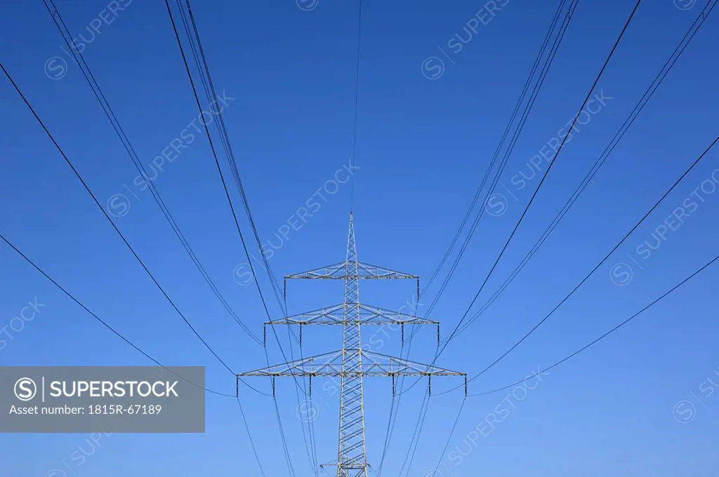 Germany, Bavaria, Power poles against blue sky