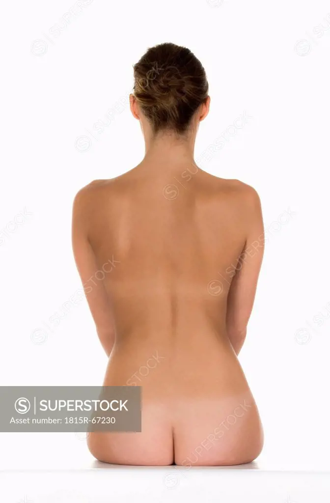 Naked young woman, rear view