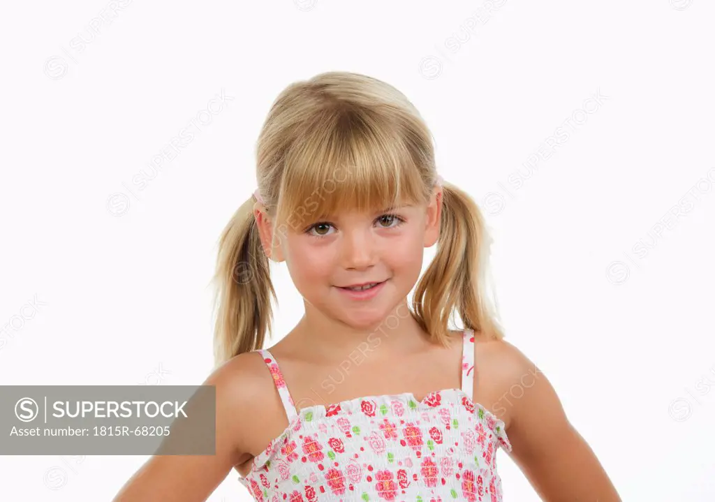 Girl 4_5 against white background, smiling, portrait