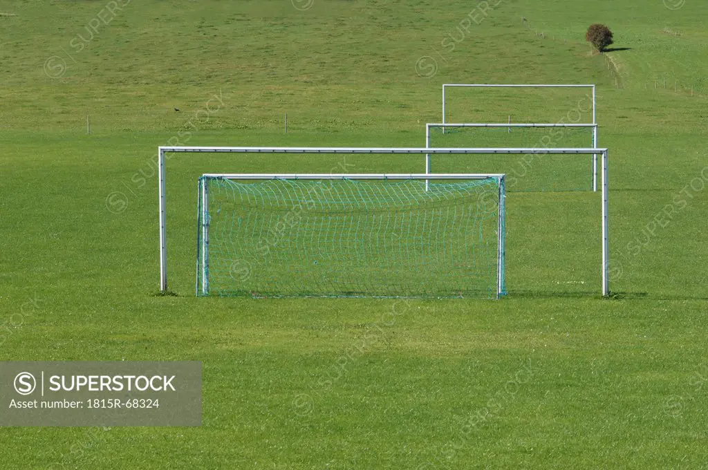 Goal posts on grass pitch.