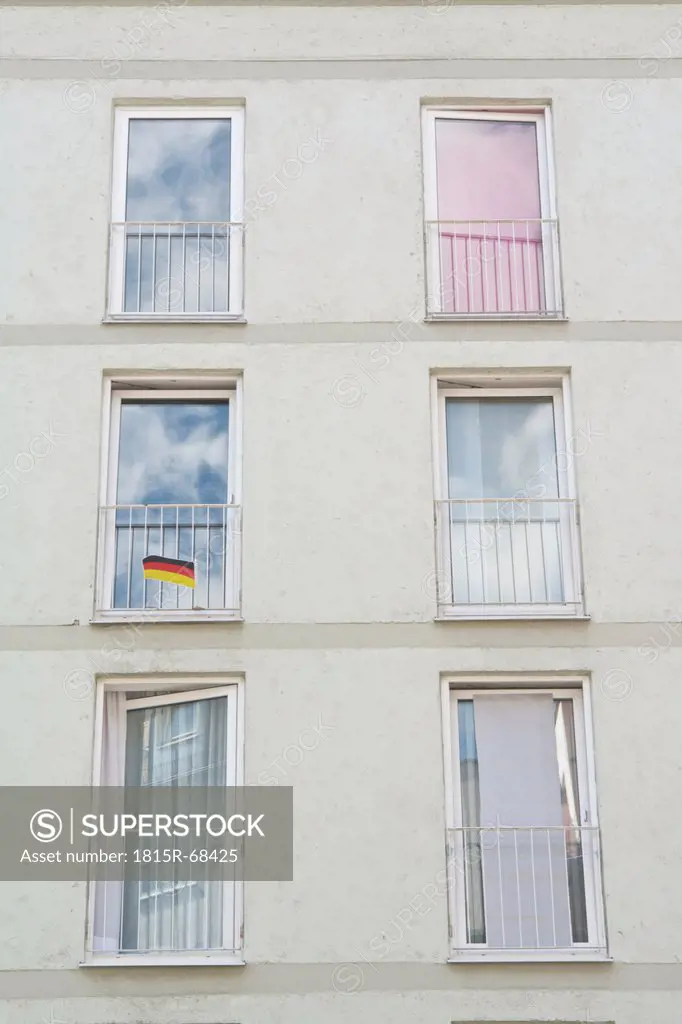 Germany, Bavaria, Munich, German flag on windows