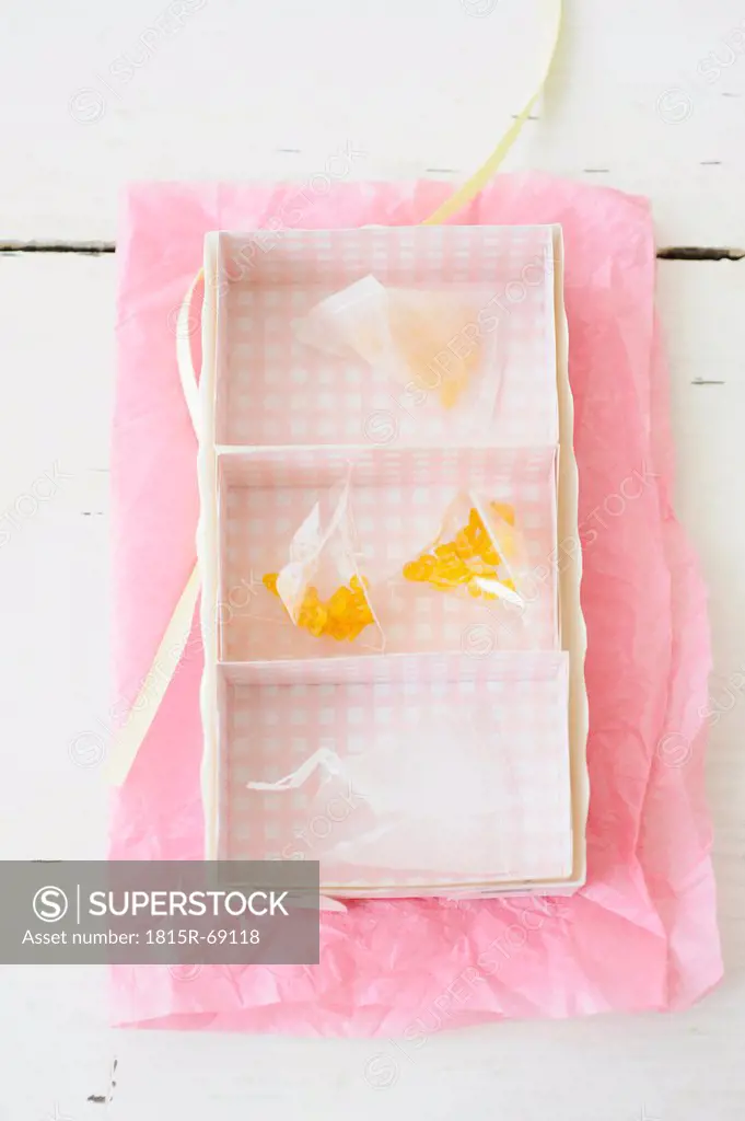 Candied lemon twist in rack on wax paper